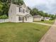 Charming home featuring a manicured lawn and an attached garage, located in a desirable neighborhood at 4020 Mindspring Dr, Raleigh, NC 27610