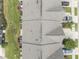 Birds eye view of townhome rooftops in an orderly community at 409 Rhamkatte Rd, Holly Springs, NC 27540
