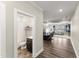 Bathroom featuring shower and vanity, seamlessly connected to the home's open living space at 409 Rhamkatte Rd, Holly Springs, NC 27540