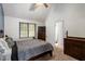 Main bedroom features a bed, carpeted floor, and attached bathroom at 4108 Lazyriver Ln, Durham, NC 27712