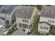 An aerial view showcasing the backyard of the home, with a screened-in porch and landscaped yard at 4120 Overcup Oak Ln, Cary, NC 27519