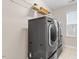 Laundry room with front load washer and dryer at 4120 Overcup Oak Ln, Cary, NC 27519