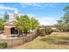 Community pool area with a large pool, lounge chairs, and a fenced-in playground at 4120 Overcup Oak Ln, Cary, NC 27519