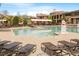 A view of the resort style community pool, with play structures and plenty of seating for residents at 4120 Overcup Oak Ln, Cary, NC 27519