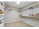 A walk-in closet features shelving and hanging racks at 4120 Overcup Oak Ln, Cary, NC 27519