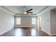 Bedroom with a ceiling fan, hardwood floors, recessed lighting, a closet, and ensuite bathroom at 421 Old Ride Dr, Holly Springs, NC 27540