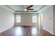 Large bedroom with hardwood floors, ceiling fan, recessed lighting, and plenty of space at 421 Old Ride Dr, Holly Springs, NC 27540