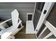 Rear porch area featuring a pet door at 421 Old Ride Dr, Holly Springs, NC 27540