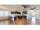 Open-concept kitchen boasting ample counter space, stainless steel appliances, and an eat-in island at 421 Old Ride Dr, Holly Springs, NC 27540