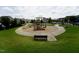 Community playground featuring play equipment and seating, creating a Gathering-friendly atmosphere at 421 Old Ride Dr, Holly Springs, NC 27540