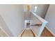 View of the home staircase leading to the second floor, with carpeted steps and a white handrail at 421 Old Ride Dr, Holly Springs, NC 27540