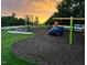 Community playground featuring colorful play structures and a safe, soft surface for children to enjoy at 43 Salt Cedar Ln, Chapel Hill, NC 27516