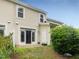Exterior showcasing a patio area and landscaped backyard at 4719 Altha St, Raleigh, NC 27606