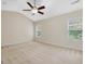 Large bedroom featuring vaulted ceilings, carpet, and ample natural light at 4719 Altha St, Raleigh, NC 27606