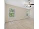 Spacious bedroom with neutral carpet, vaulted ceilings, and natural light at 4719 Altha St, Raleigh, NC 27606