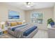 Nicely decorated bedroom with stylish blue and gold accents and lots of light at 4719 Altha St, Raleigh, NC 27606