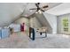 Upstairs game room with foosball table and mini-fridge at 4720 Yates Mill Pond Rd, Raleigh, NC 27606