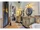 The ensuite bathroom boasts double sinks, a walk-in shower, and a soaking tub at 4720 Yates Mill Pond Rd, Raleigh, NC 27606