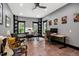 Office featuring a ceiling fan, unique flooring, and natural light from multiple windows at 4924 Stoneyoak Ln, Raleigh, NC 27610