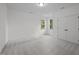 A bright bedroom with plush carpeting, closet, and natural light at 5034 Blendon Trl, Garner, NC 27529