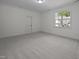 A bright and airy bedroom with plush carpet and a sunlit window at 5034 Blendon Trl, Garner, NC 27529