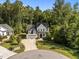 An impressive two-story home with a three-car garage, beautiful landscaping, and large driveway at 5034 Blendon Trl, Garner, NC 27529