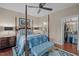 Charming bedroom with a four-poster bed, en suite bathroom and walk-in closet at 515 N Churton St # 203, Hillsborough, NC 27278