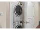 Convenient in-unit laundry area with stacked washer and dryer, saving space at 515 N Churton St # 203, Hillsborough, NC 27278