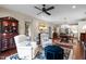 Inviting living room featuring hardwood floors, recliner chairs, and stylish decor at 515 N Churton St # 203, Hillsborough, NC 27278