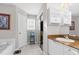 Bathroom with large vanity, walk in closet and a soaking tub at 5512 Grand Traverse Dr, Raleigh, NC 27604