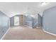 Spacious bonus room with carpet, neutral paint, good natural light, and a ceiling fan at 5512 Grand Traverse Dr, Raleigh, NC 27604