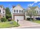 Charming two-story home with brick accents, attached garage, well-manicured lawn, and a welcoming curb appeal at 5512 Grand Traverse Dr, Raleigh, NC 27604