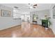 Bright and airy living room with hardwood floors, a fireplace, and natural light at 5512 Grand Traverse Dr, Raleigh, NC 27604