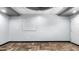 Bonus room featuring luxury flooring, a modern ceiling, and a white board at 5820 Wake Forest Hwy, Durham, NC 27703