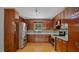 Modern kitchen showcasing stainless steel appliances, custom cabinetry, and sleek countertops for culinary enthusiasts at 5820 Wake Forest Hwy, Durham, NC 27703