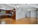 Modern open-concept layout combining living and kitchen areas with hardwood floors at 5820 Wake Forest Hwy, Durham, NC 27703
