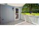 Charming covered porch area with a view of the front yard at 5820 Wake Forest Hwy, Durham, NC 27703