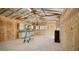 Unfinished storage area with cabinets and work surfaces, offering a blank canvas for customization at 5820 Wake Forest Hwy, Durham, NC 27703