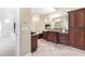 Elegant bathroom features granite counters, fireplace, soaking tub, and a walk-in shower at 6005 Carlyle Dr, Raleigh, NC 27614
