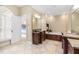 Bathroom with granite counters, soaking tub with fireplace, and walk-in shower at 6005 Carlyle Dr, Raleigh, NC 27614