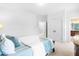 Airy bedroom with plush carpet, queen bed, leading to bathroom and closet, designed for comfort at 6005 Carlyle Dr, Raleigh, NC 27614