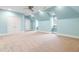 Spacious bonus room with dormers, neutral carpeting, and double closets, great for flexible living at 6005 Carlyle Dr, Raleigh, NC 27614