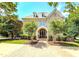 Charming brick home with well-manicured landscaping and a welcoming entrance, perfect for Gathering living and curb appeal at 6005 Carlyle Dr, Raleigh, NC 27614
