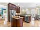 Kitchen features stainless steel appliances, hardwood floors, and plenty of cabinet space at 6005 Carlyle Dr, Raleigh, NC 27614