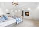 A spacious main bedroom with fireplace, ensuite bathroom, and walk-in closet at 6005 Carlyle Dr, Raleigh, NC 27614