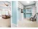 Walk-in closet is freshly painted and features custom shelving and natural light at 6005 Carlyle Dr, Raleigh, NC 27614