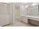 Bathroom featuring a vanity and a shower with a neutral color scheme at 604 Eden Ln, Chapel Hill, NC 27517