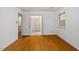 Bedroom featuring hardwood floors, a window, and neutral walls at 604 Eden Ln, Chapel Hill, NC 27517