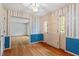 Inviting foyer with hardwood floors, decorative trim, and a view into other rooms at 604 Eden Ln, Chapel Hill, NC 27517