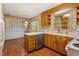 Kitchen with white countertops, stainless steel dishwasher and wood cabinets at 604 Eden Ln, Chapel Hill, NC 27517